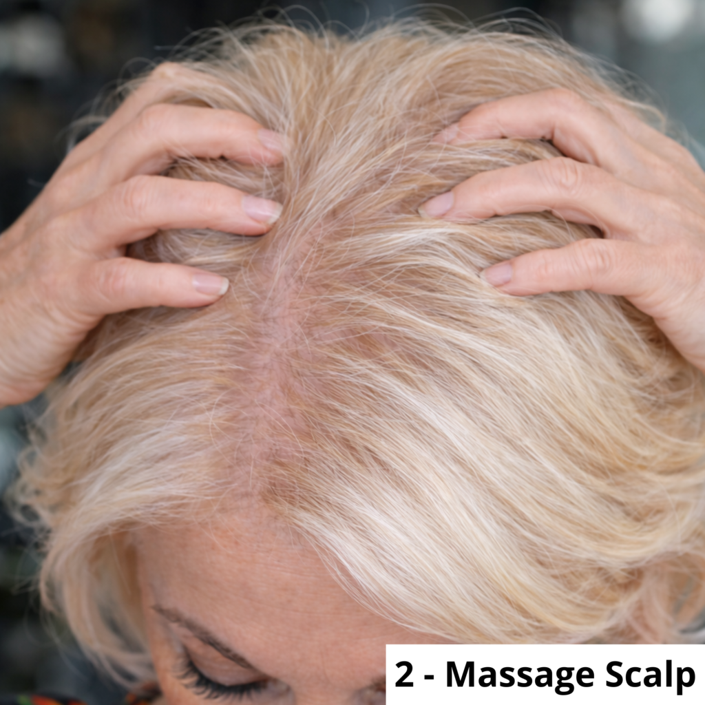 Massaging scalp after applying hair serum to stimulate circulation and promote hair growth